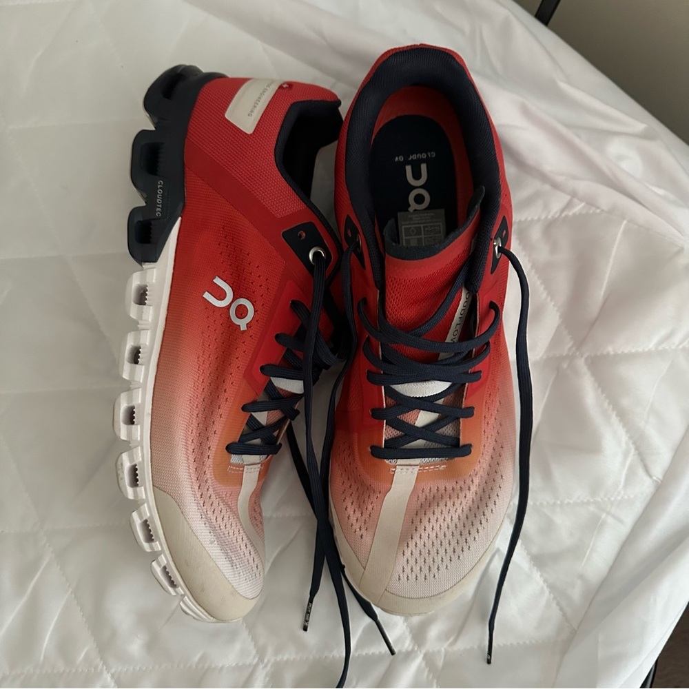 On Running Men’s 9M athletic shoes red blue
